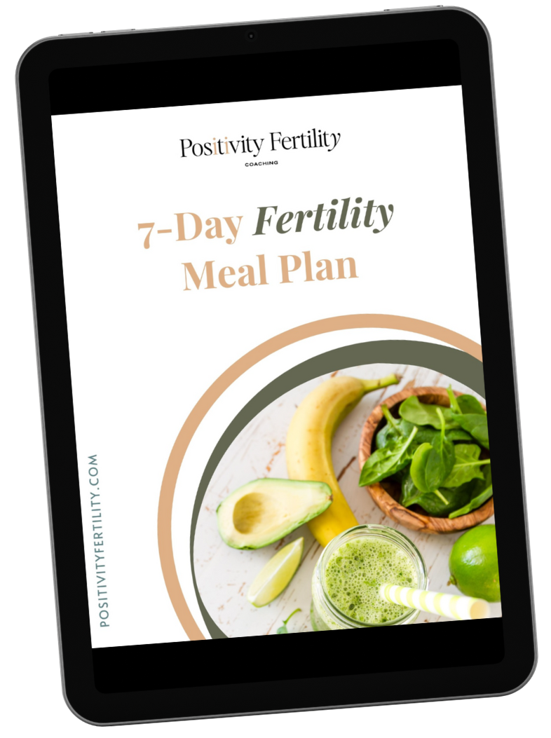 Tablet screen shows a healthy meal next to the words: 7-Day Fertility Meal Plan